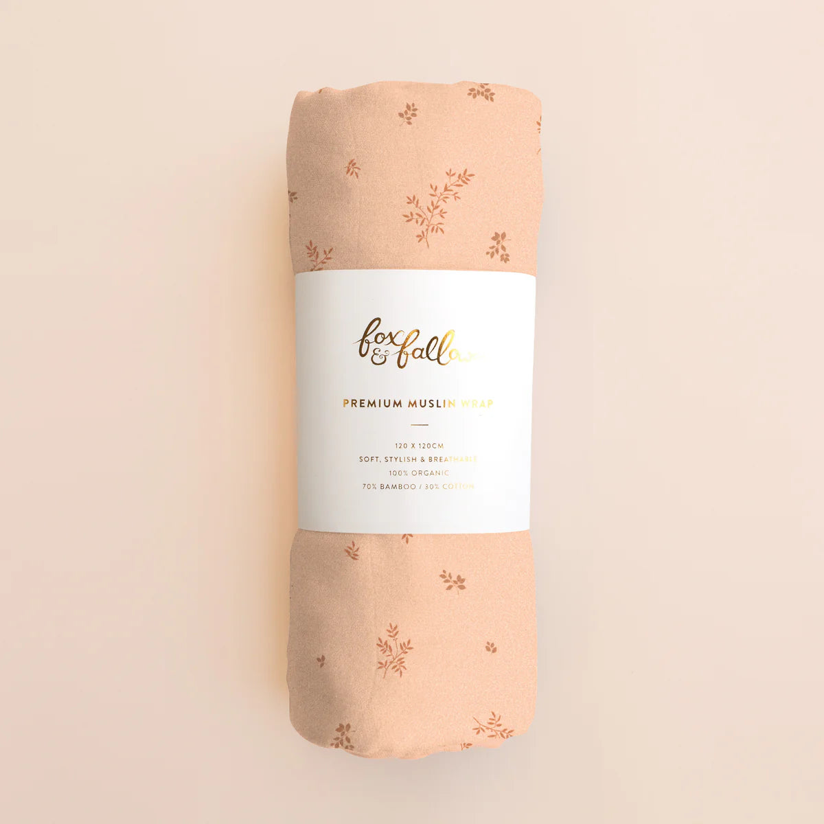 Rolled Fox and Fallow Wild Ruscus muslin wrap, 70%
organic bamboo 30% cotton swaddle
