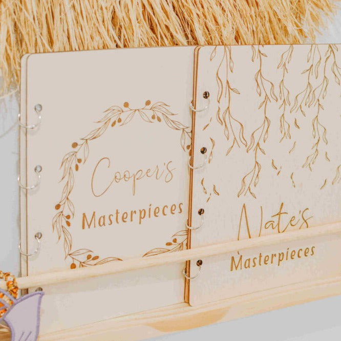 Olive Leaf and Weeping Willow children's art binders — two personalised design options shown together