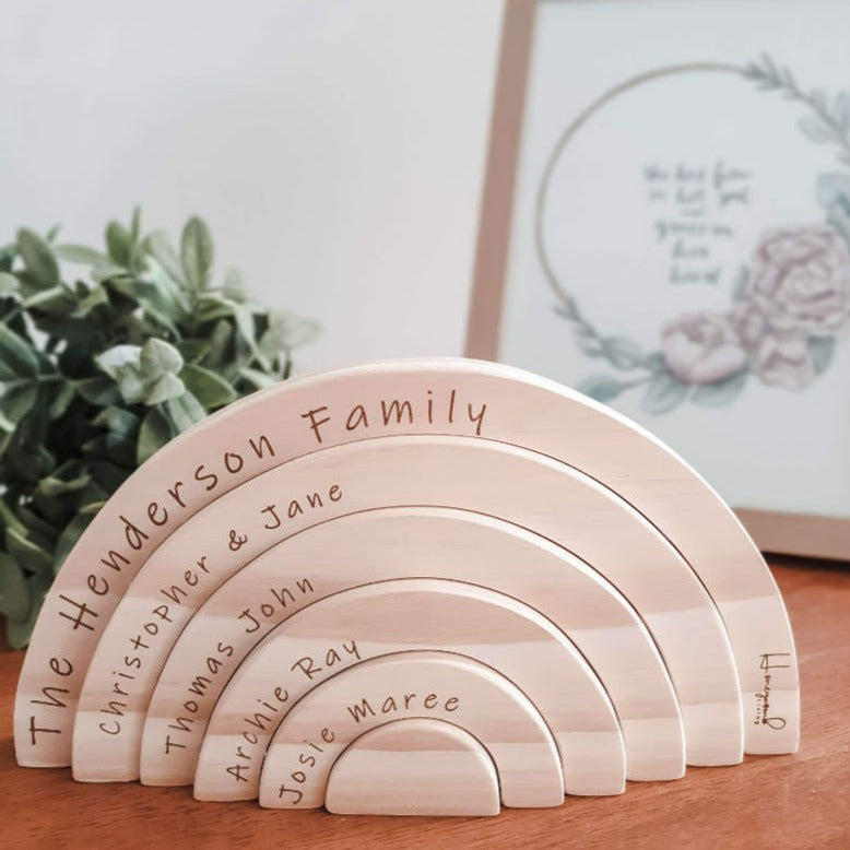Personalised wooden family rainbow with names engraved on each arch — unique family keepsake