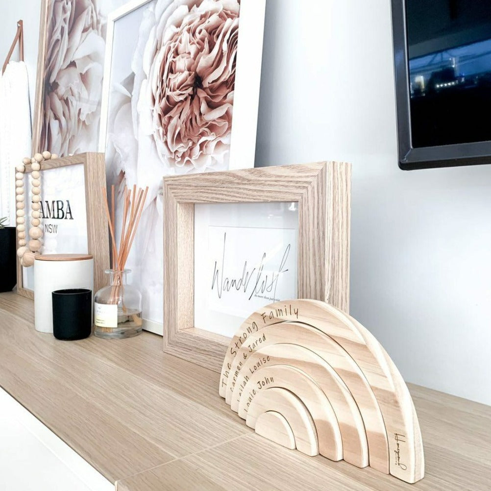 Personalised wooden family rainbow — each arch engraved with a family member's name, Australia