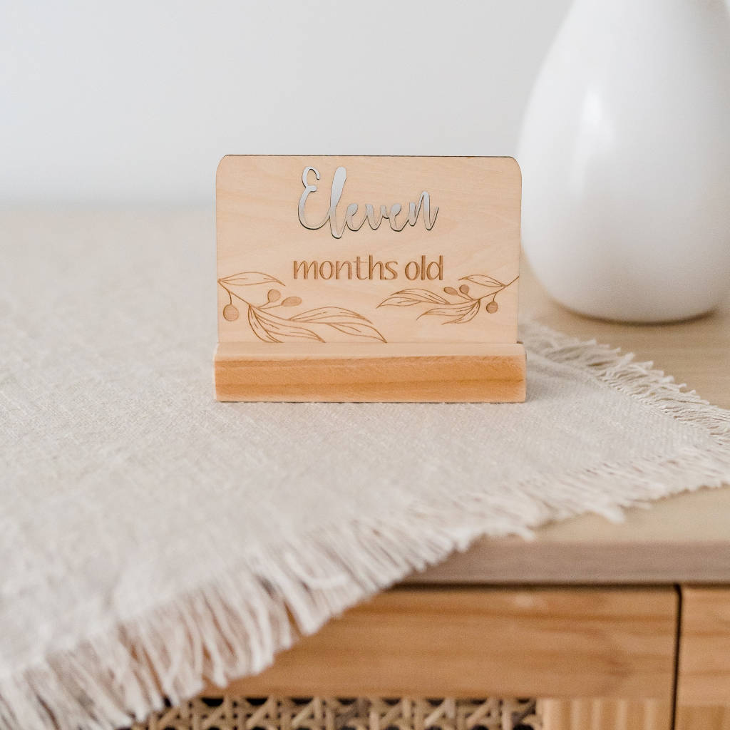 Handmade wooden stand for milestone cards. Made in Australia by Honeycomb Living