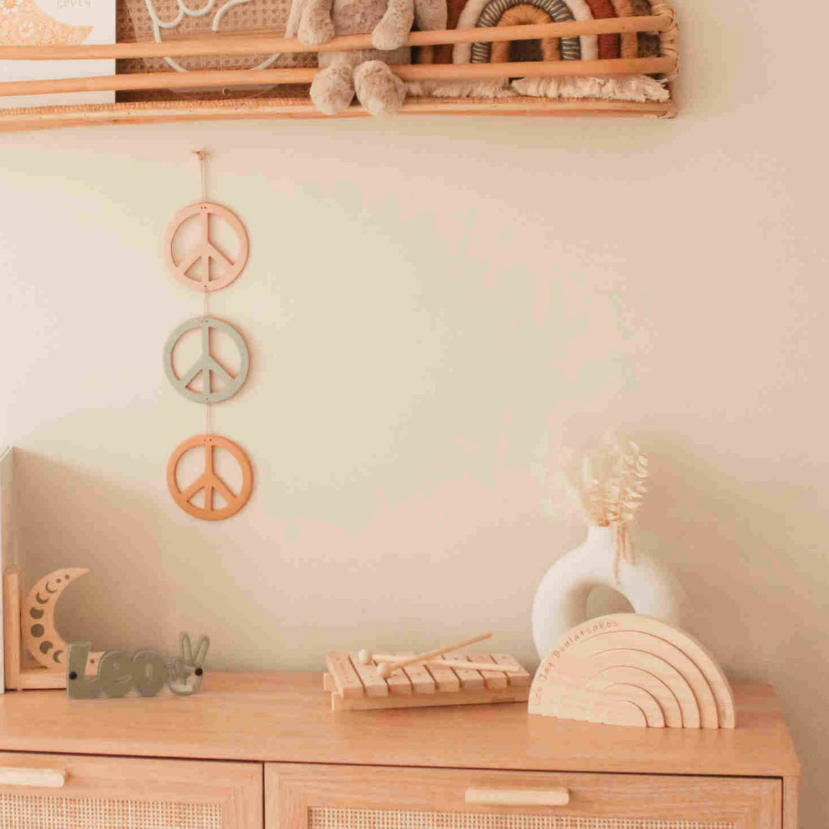 Personalised wooden name rainbow displayed in nursery — Australian handmade baby gift